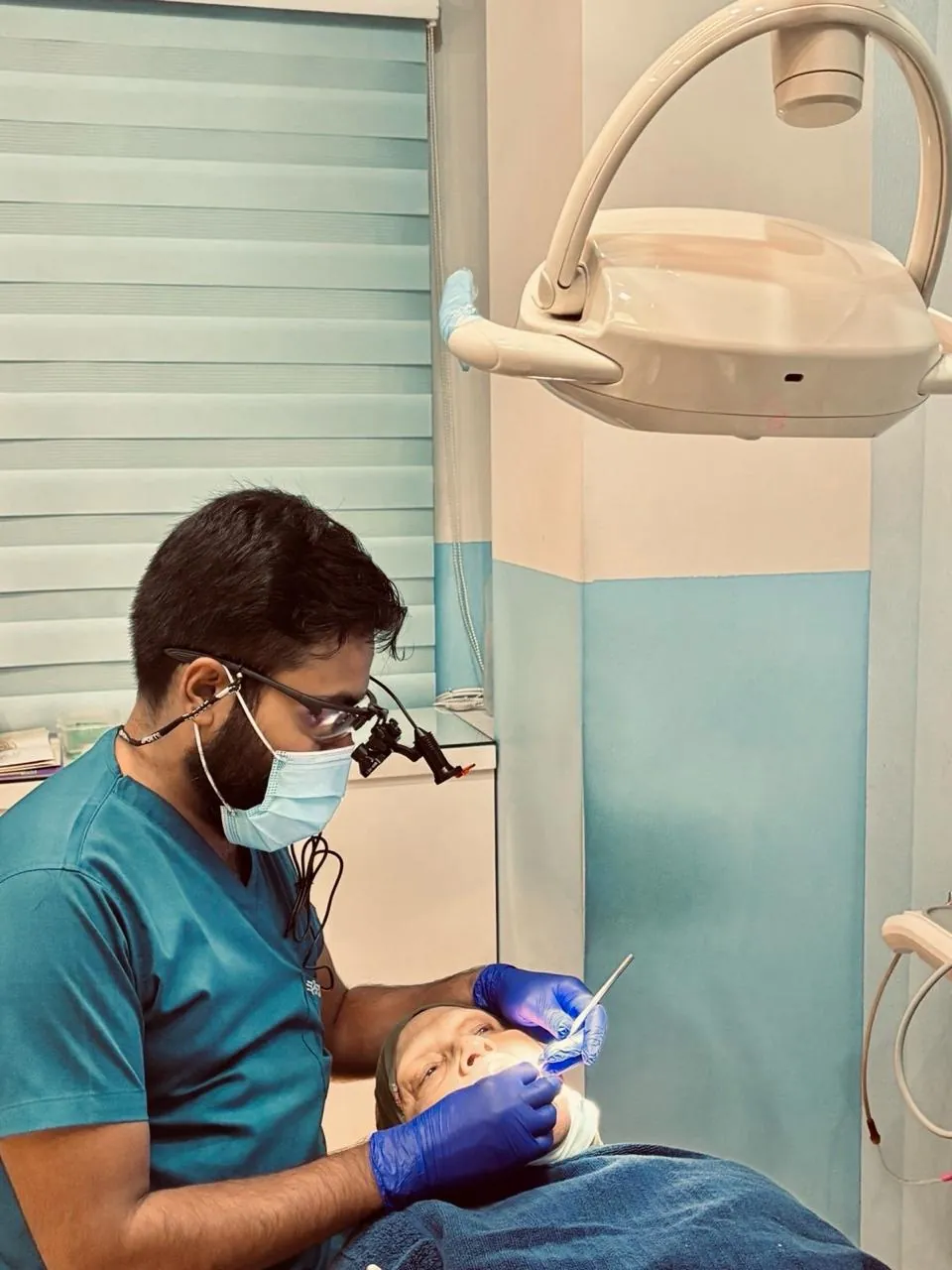 A calm, modern treatment room at Ortho Dent